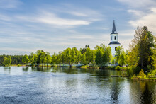 Sweden, Vasterbotten County, Sorsele, Lake In Summer With Church Bell Tower In Background