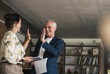 © Westend61 - Happy businessman giving high-five to colleague at work place