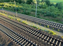 Empty Railways In The Summer Landscape