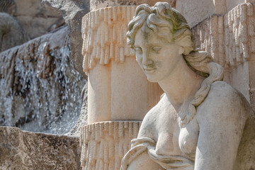 Poster - Old sculpture of a sensual woman nymph bathing at the fountain in Zwinger gardens at historical and museums downtown of Dresden, Germany.