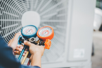 Wall Mural - Air Conditioning Technician and A part of preparing to install new air conditioner.