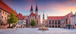 Brunswick, Germany. Panoramic cityscape image of historical downtown of Brunswick, Germany with St. Martini Church and Old Town Hall at summer sunset.