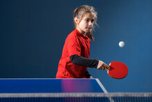  Girl Child Plays Ping Pong On Indoor