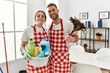 © Krakenimages.com - Young caucasian couple cleaning at home.