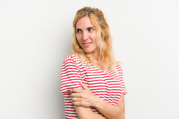 Young caucasian woman isolated on white background laughing and having fun.