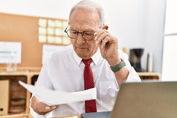 Sticker - Senior man business worker reading document working at office