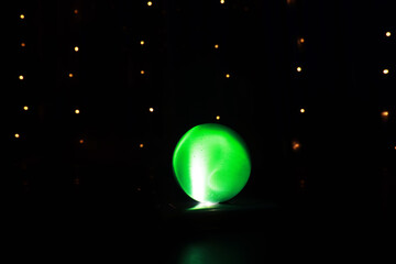 Wall Mural - Background with glowing ball and bokeh. Ball for predictions. Clairvoyant ball.