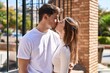 © Krakenimages.com - Mand and woman couple hugging each other and kissing at street