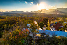 Aerial Shot Of Thai Buddhist Temple With Beautiful Sunset