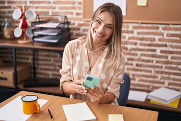 Sticker - Young caucasian woman business worker using smartphone working at office