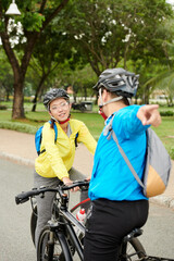 Poster - Friends deciding where to ride on bicycles