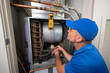 © spatesphoto - Hvac Technician checking voltage on a blower motor