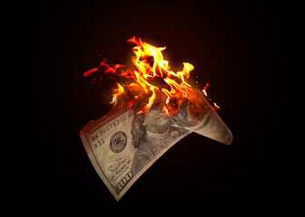 One hundred dollar banknote burning on black background