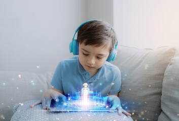 Kid building robot game on tablet with notification face icon pop up,Boy programming Robot on digital pad with double exposure screen web surfing,cyber diagram interface,Education technology