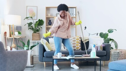 Canvas Print - A funny woman dancing and singing while doing domestic work in her house. A high energy young female having fun while sweeping her home. A cheerful lady housekeeping cleaning the lounge