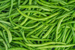 © Tania - Fresh green bean pods texture. Close up, top view