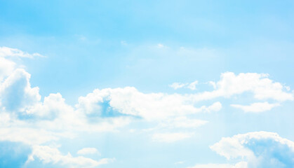 Wall Mural - a vast light blue sky with freedom shape of fluffy clouds floating over the air. soft and pure cloud