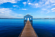 Charming Blue Boathouse At The End Of A Pier In Crawley, Western Australia