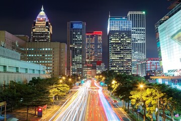 Wall Mural - Nightscape of Downtown Taipei, the vibrant capital city of Taiwan, with high-rise office towers & busy traffic trails on the street in XinYi Financial District~Beautiful cityscape of Taipei after dark