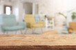 © tomertu - Wooden empty table in front of Living room interior. For product display and presentation