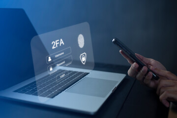 Person using laptop and touching virtual screen for two-factor authentication for safety use of social networks and access to information privacy