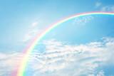 Fototapeta Tęcza - rainbow in cloudy sky