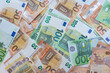 A lot of money euro and bills on desk. exchange or saving concept. Paper banknotes