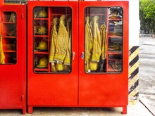 Red Storage Cabinets That Store Fire Extinguishers And Fire Extinguishers.