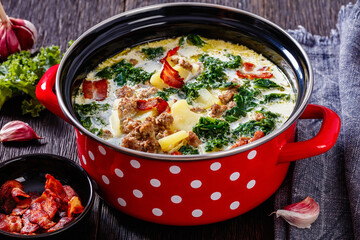 Wall Mural - Zuppa Toscana,Tuscan Soup in red pot, top view