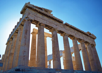 Photo of parthenon ruins in Athens, acropolis in Greece - Former ancient greek temple for Athena olympus goddess - Decorative sculptures, columns from ancient greece art, architecture and civilization