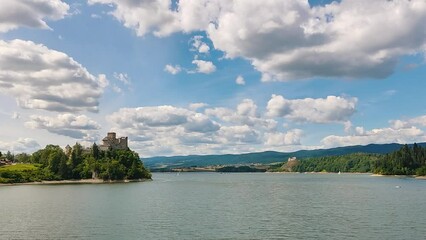 Wall Mural - Niedzica Castle Also Known as Dunajec Castle by Lake Czorsztynin the Pieniny Mountains, Poland. And Tourist Ferrys in the Lake. Summer Day With Fast Moving Clouds. Czorsztyn Castle at the Background