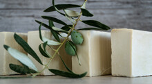 Natural Olive Oil Soap. Organic Handmade Soap Bars With Olive Branch Concept. Skin Care Products. Selective Focus.