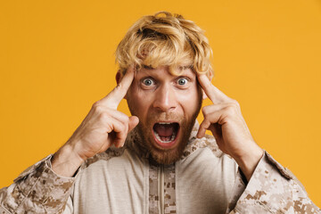 Wall Mural - European military man with headache rubbing his temples