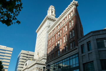 Wall Mural - morning sun rises on the iconic city hall in Downtown Oakland