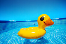 Inflatable Cute Surprised Yellow Duck Swim In The Pool