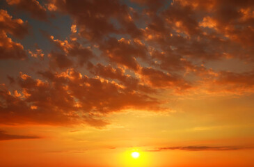 Wall Mural - beautiful view of orange sky with clouds at sunset