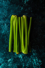Overhead View Of Bunches Of Celery On A Table
