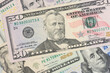 © grthirteen - 5, 20, 50, 100 dollars banknotes at different angles. Close up of dollars on white background.