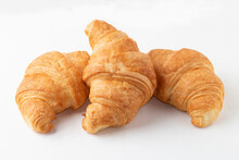 Triple Salty Croissant Isolated On White Background.