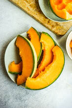 Overhead View Of Cantaloupe Melon Slices On A Plate