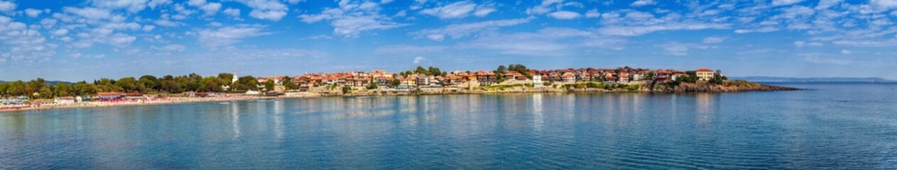 Wall Mural - Seaside landscape, panorama, banner - view of the embankment with fortress wall and beach in the city of Sozopol on the Black Sea coast in Bulgaria