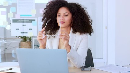 Sticker - Stressed, frustrated and irritated young business woman suffering from a headache, migraine or mental fatigue. Corporate female working on a laptop at her office desk, struggling to meet a deadline