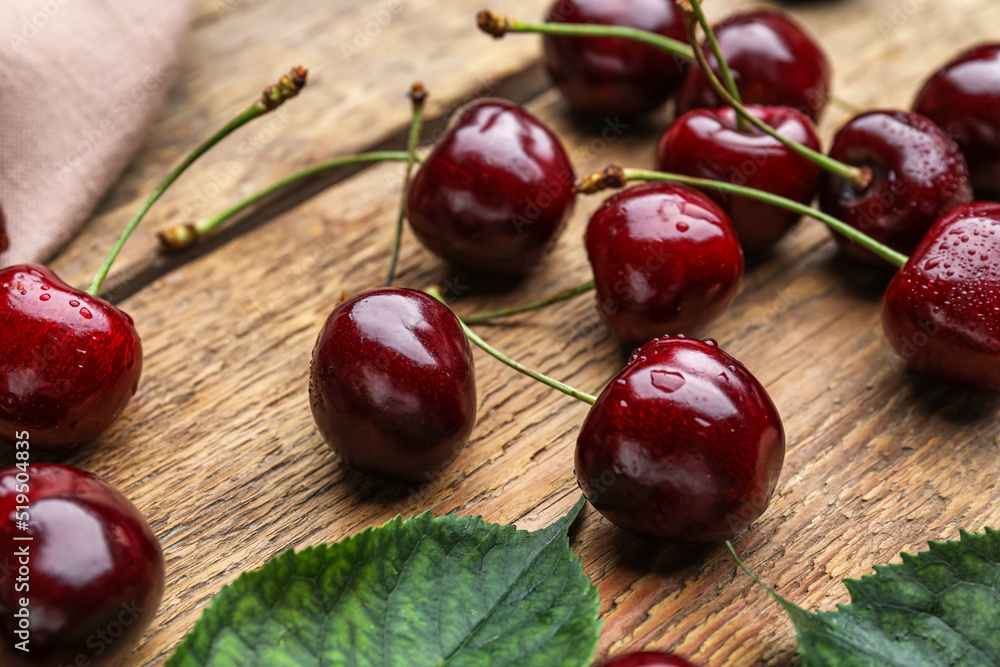 Tasty cherry on wooden background, closeup