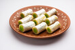 Kaju Pista Roll Or Cashew Pistachio Rolls Mithai or sigar, Indian sweet or dessert for festivals