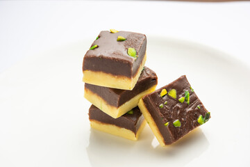 Choco Vanilla Pateesa or chocolate mawa barfi or or two layered burfi, Indian sweet or dessert