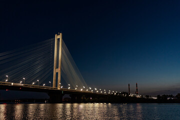 Wall Mural - The South bridge at night, Kyiv, Ukraine. Bridge at sunset across the Dnieper River.