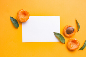 card mockup with apricots and leaves