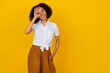 © deagreez - Photo of cool curly hairdo young lady show okey wear white blouse isolated on yellow color background
