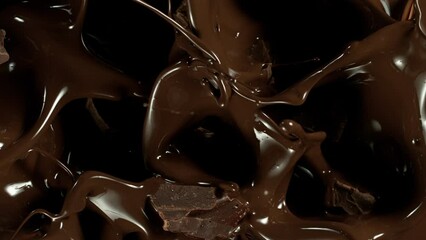 Poster - Super Slow Motion of Falling Chocolate Pieces Into Melted Chocolate. Filmed on High Speed Cinema Camera, 1000fps.