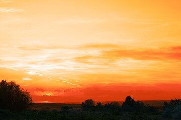 Wall Mural - picturesque view of beautiful orange sky at sunset